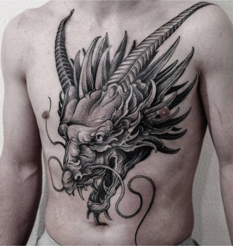 Xăm đấu rồng ở ngực tạo nên sự oai phong