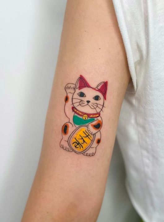 Ý nghĩa hình xăm mèo thần tài 