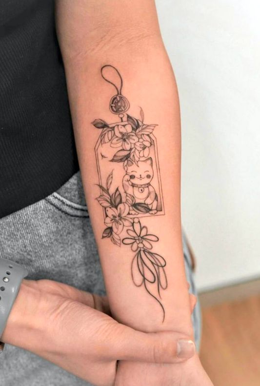 Hình xăm mèo thần tài trên tay dành cho nam và nữ